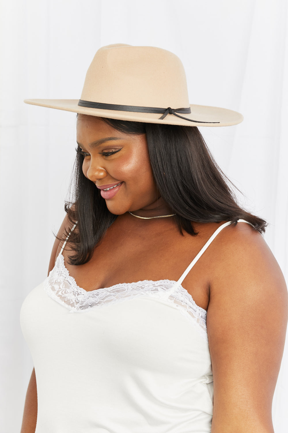 Fame Make It Work Fedora HatStyle meets versatility with our Fame Make It Work Fedora Hat. The soft beige color complements any outfit, while the elegant faux leather knot detailing adds a modeHatsPlush Fashion ShopPlush Fashion ShopWork Fedora Hat