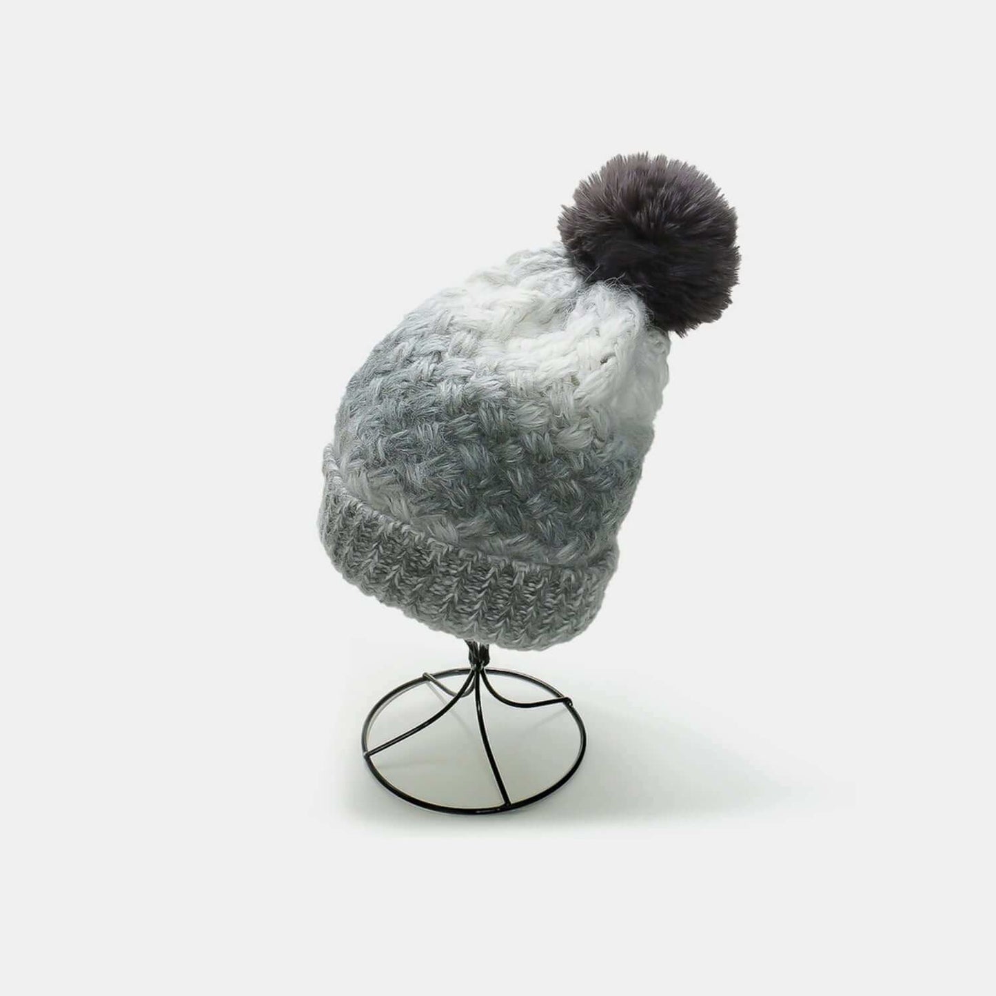 Gradient Knit Hat with PompomStay warm and stylish with our Gradient Knit Hat with Pompom! Made with a soft and cozy blend of acrylic and polyester, this imported hat is the perfect addition to HatPlush Fashion ShopPlush Fashion ShopGradient Knit Hat