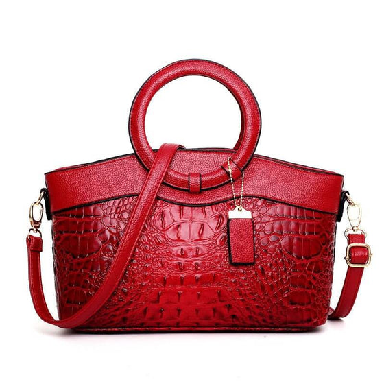 Luxury handbags for moms with crocodile print in vibrant red, featuring a large size and durable polyester material.