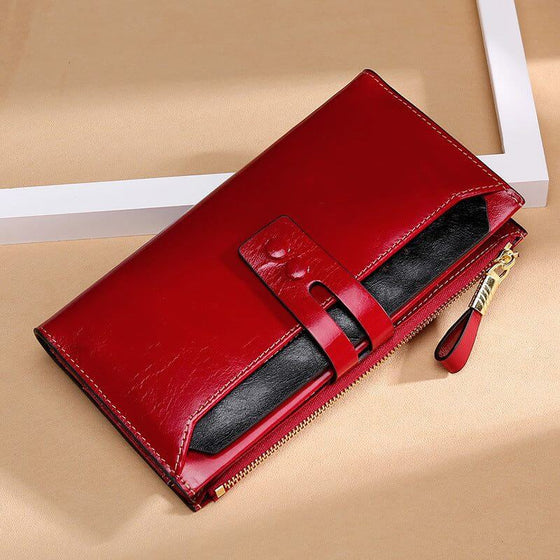 Multi Card Buckle Long Oil Wax Leather Wallet in red with soft surface and buckle closure.