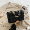 Woven small cowhide square chain shoulder handbag, black, stylish and versatile.