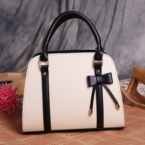 ETUDE shark summer version bow lady handbag with playful design and elegant bow.