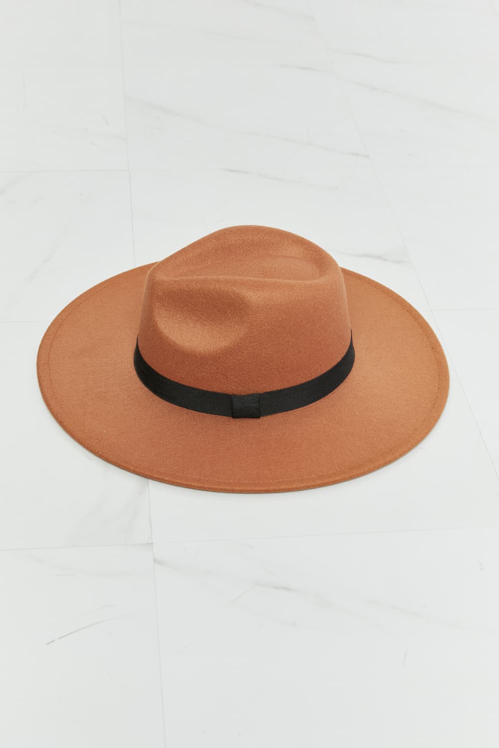 Fame Enjoy The Simple Things Fedora HatIntroducing the Fame Enjoy The Simple Things Fedora Hat, crafted with high-quality materials for lasting durability and comfort. Its classic tan color and chic blackHatsPlush Fashion ShopPlush Fashion ShopSimple Things Fedora Hat