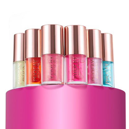 PHOFAY Jelly Lip Oil collection in assorted colors and rose gold caps on pink background.