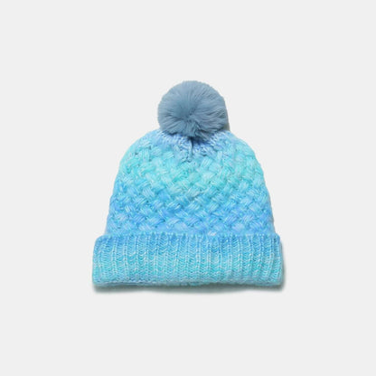 Gradient Knit Hat with PompomStay warm and stylish with our Gradient Knit Hat with Pompom! Made with a soft and cozy blend of acrylic and polyester, this imported hat is the perfect addition to HatPlush Fashion ShopPlush Fashion ShopGradient Knit Hat