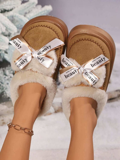 Bow Suede Platform Plush SlippersWrap your feet in luxury with our Bow Suede Platform Plush Slippers. The soft suede material and platform design provide ultimate comfort, while the stylish bow addsSlippersPlush Fashion ShopPlush Fashion ShopBow Suede Platform Plush Slippers