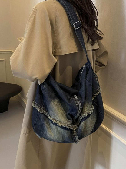 Raw Hem Gradient Crossbody Bag For womenUpgrade your style with the Raw Hem Gradient Crossbody Bag! This Large-sized bag is made from high-quality denim, giving it a trendy and chic look. Carry all your esHandbagPlush Fashion ShopPlush Fashion ShopRaw Hem Gradient Crossbody Bag