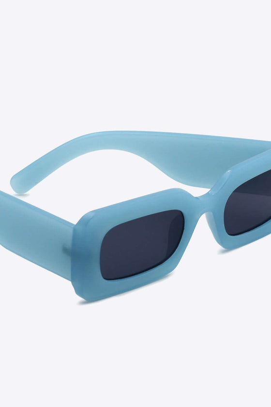 Polycarbonate Frame Rectangle SunglassesProtect your eyes in style with our Polycarbonate Frame Rectangle Sunglasses! Featuring a durable polycarbonate frame and lens, these sunglasses not only provide UV4Sun glassesPlush Fashion ShopPlush Fashion ShopPolycarbonate Frame Rectangle Sunglasses