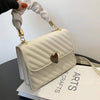 Women handbags fashion chain shoulder bag with love metal design in white.