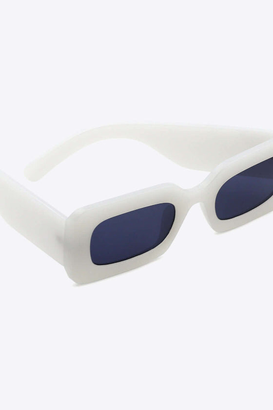 Polycarbonate Frame Rectangle SunglassesProtect your eyes in style with our Polycarbonate Frame Rectangle Sunglasses! Featuring a durable polycarbonate frame and lens, these sunglasses not only provide UV4Sun glassesPlush Fashion ShopPlush Fashion ShopPolycarbonate Frame Rectangle Sunglasses